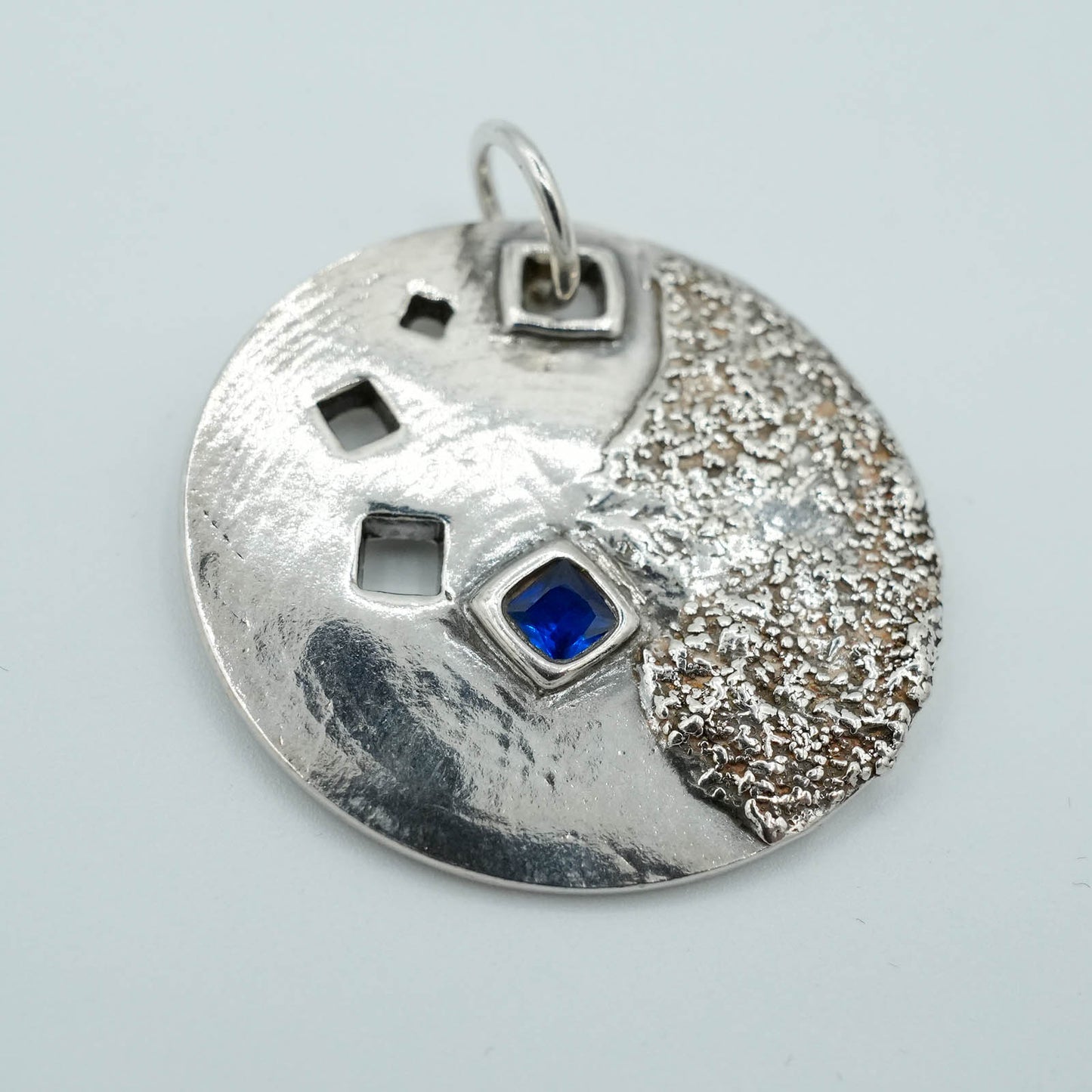 Circular Precious Metal Clay Textured Pendant with Blue Crystal embellishment
