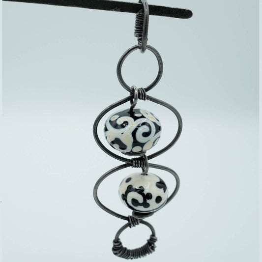 Hollow Lamp-worked Glass Beads and Steel Wire Pendant