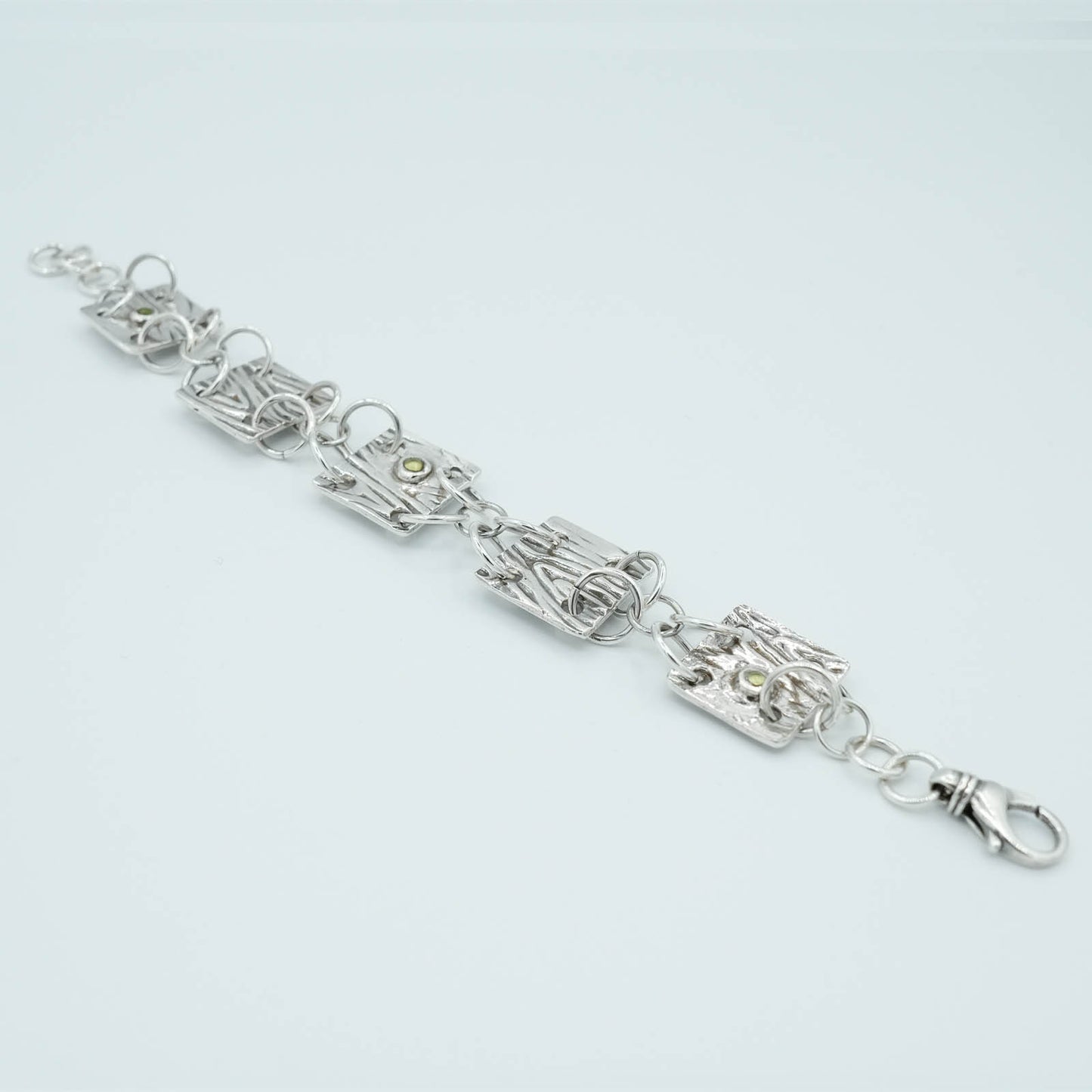 Precious Metal Clay textured and shaped Bracelet with Crystal Details