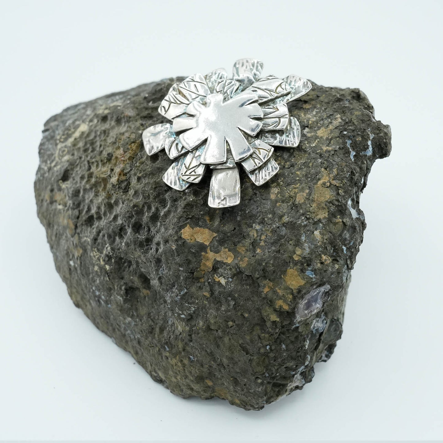 Textured Star Burst shaped Precious Metal Clay Pendant with Raised Texture and Patina