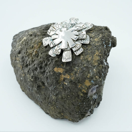 Textured Star Burst shaped Precious Metal Clay Pendant with Raised Texture and Patina