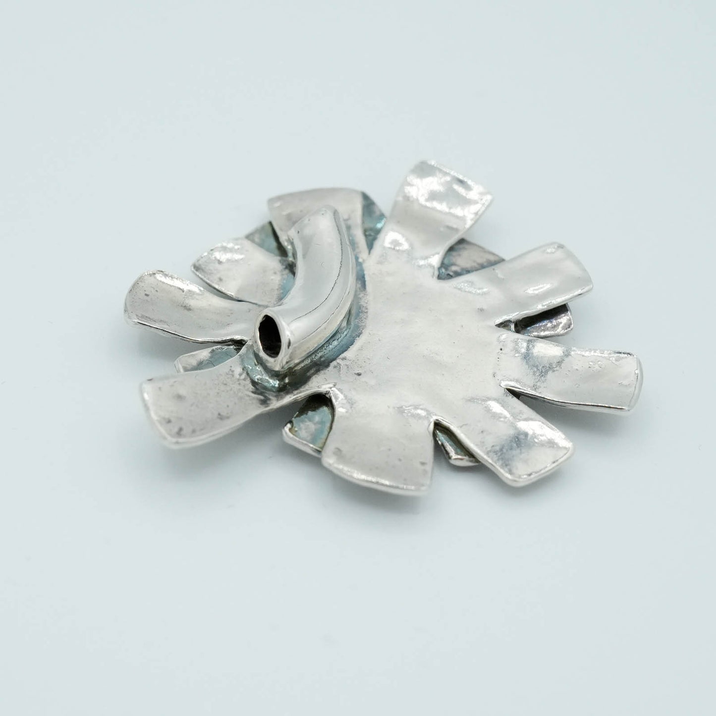 Textured Star Burst shaped Precious Metal Clay Pendant with Raised Texture and Patina
